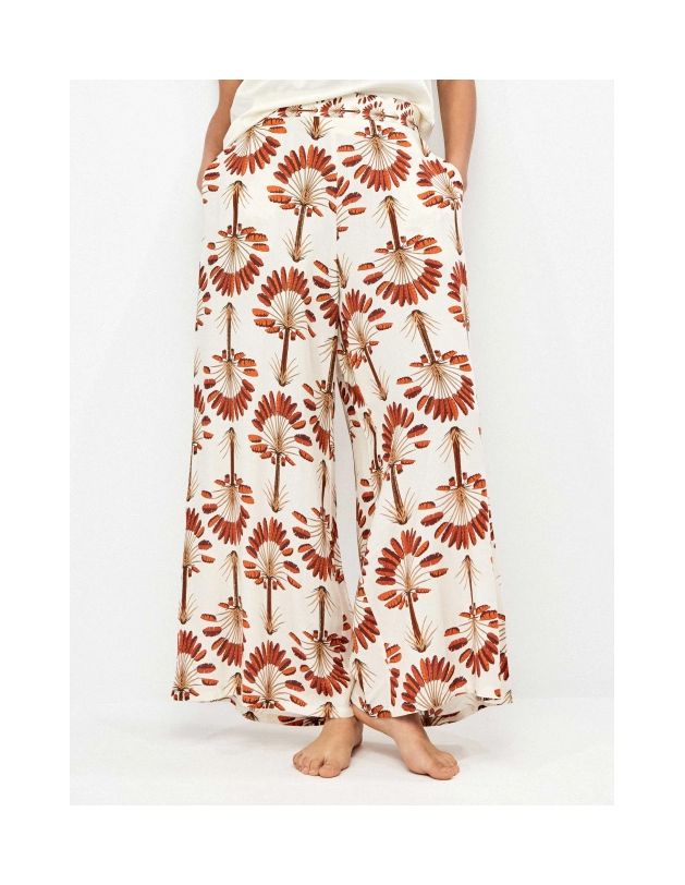 Pantalón largo pierna ancha estampado palmeras