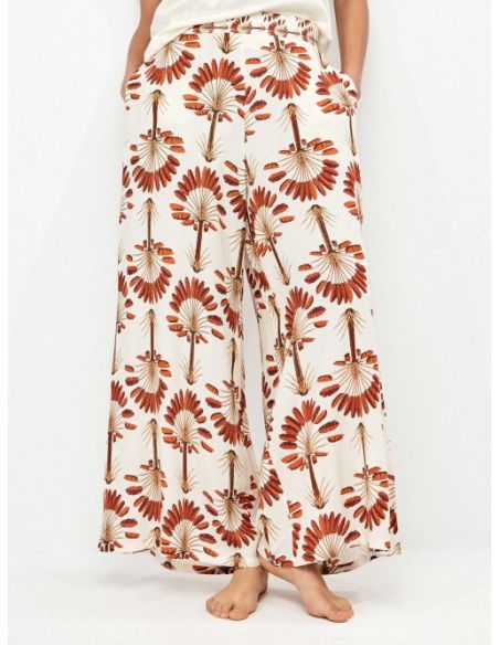 Pantalón largo pierna ancha estampado palmeras
