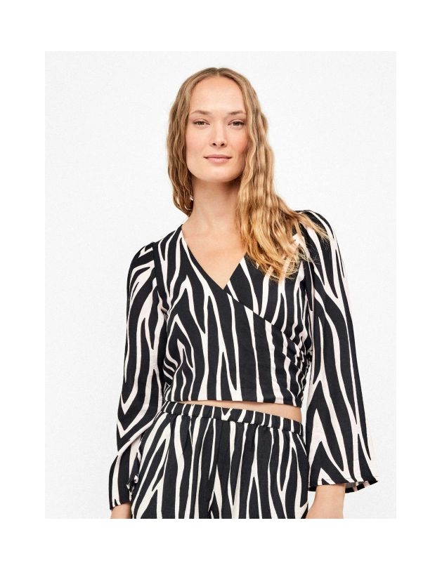 Top de manga larga estampado cebra