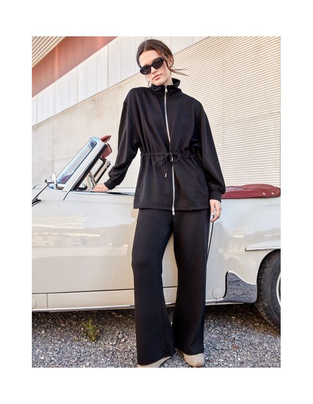 Chaqueta larga felpa con cinturilla ajustable